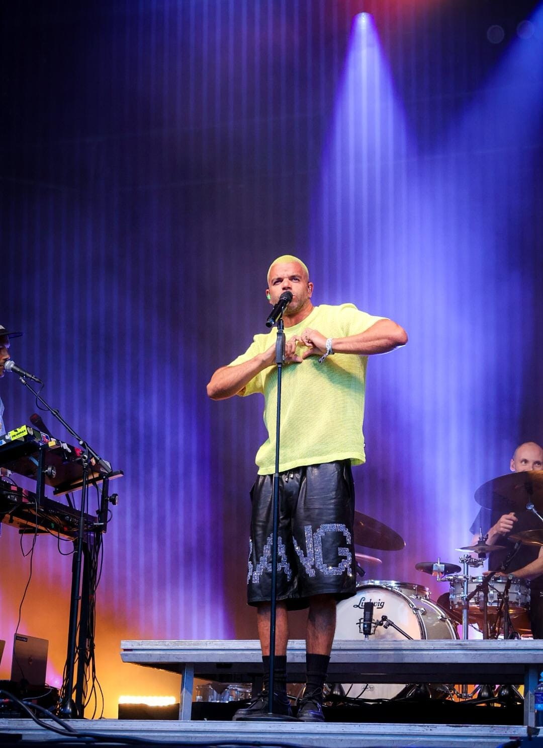 Singer Sef on stage, photographed live by JP Captivated.