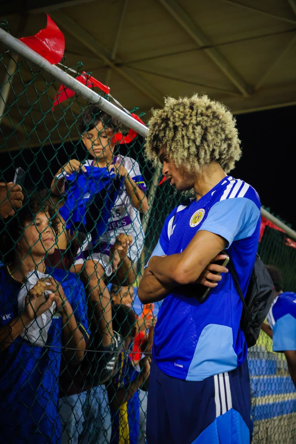 Interaction between athlete and audience photographed by JP Captivated.